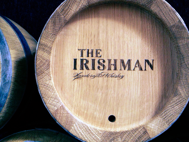 Laser engraved branding on wooden casks. Walsh Whiskey.